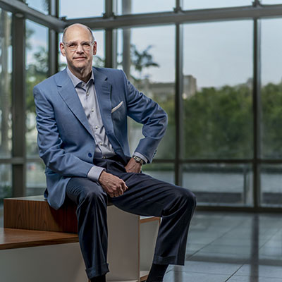 man sitting on desk