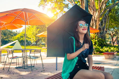 Student Cane Under Umbrella